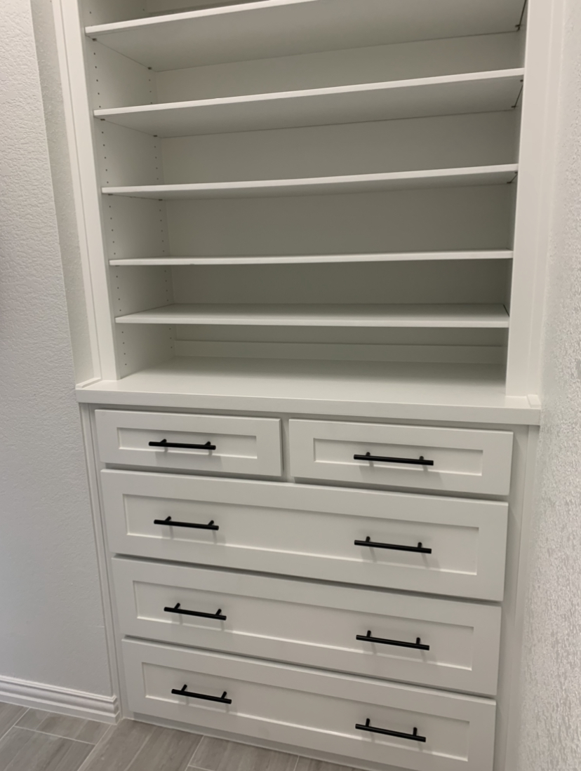  Custome shelving in the master closet. 