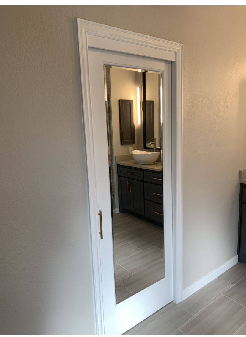  Framed mirror pocket door. 