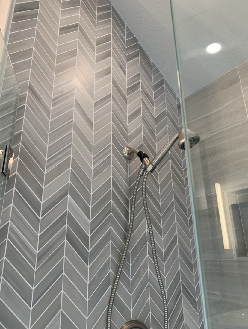  Beautiful full ceiling height herringbone accent wall. 